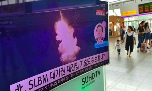 Satellite photos suggest North Korea preparing submarine missile test