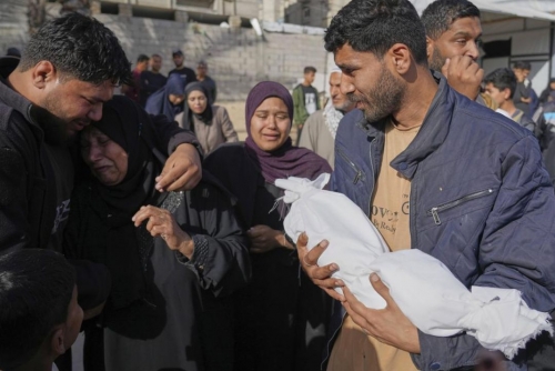 Three babies among 11 left dead in Israel strike 