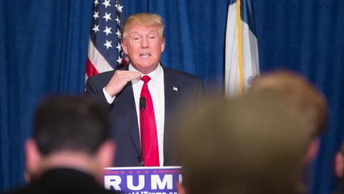 Trump brands Merkel migrant policy 'insane' Trump brands Merkel migrant policy 'insane'