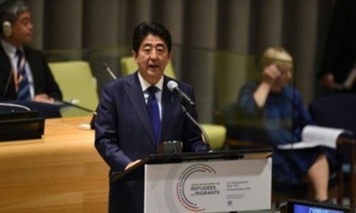 Japan backs off pregnancy clause for Syria refugees