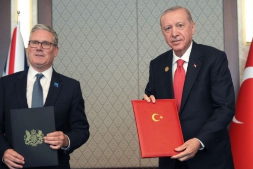 Erdogan Gifts Starmer Personalised Pistol at NATO Summit Erdogan Gifts Starmer Personalised Pistol at NATO Summit