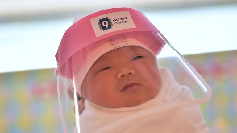 Newborn babies in Thailand given face shields to protect them from COVID-19