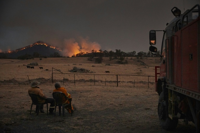 Rainstorms douse bushfires across eastern Australia Rainstorms douse bushfires across eastern Australia