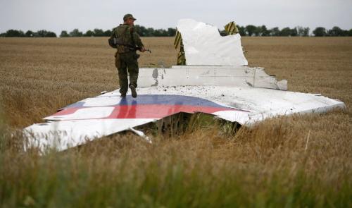 Ukraine blames MH17 downing on 'trained Russian servicemen' Ukraine blames MH17 downing on 'trained Russian servicemen'