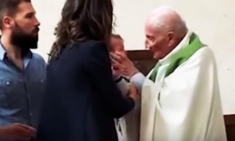 French priest suspended for slapping baby during baptism 