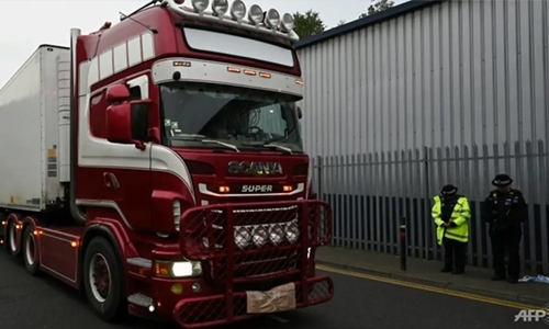 UK driver admits two charges after bodies found in truck