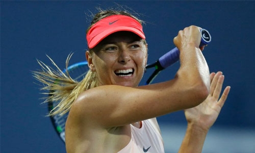 Sharapova withdraws from Stanford with left arm injury