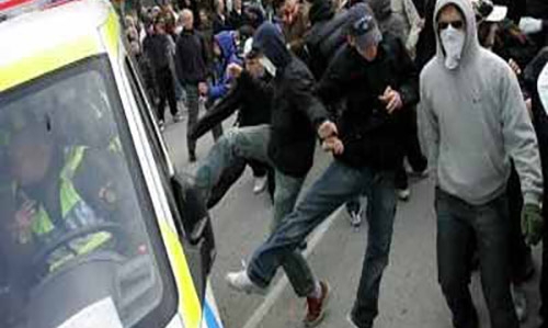 Masked gangs attack migrants in Sweden: police Masked gangs attack migrants in Sweden: police