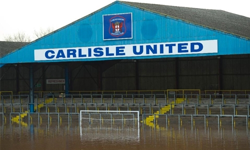 Britain to review defences after floods