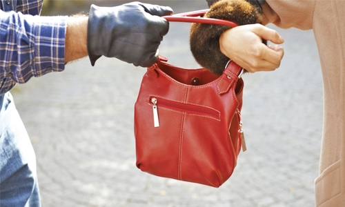 Stealing handbag; Jail terms reduced Stealing handbag; Jail terms reduced