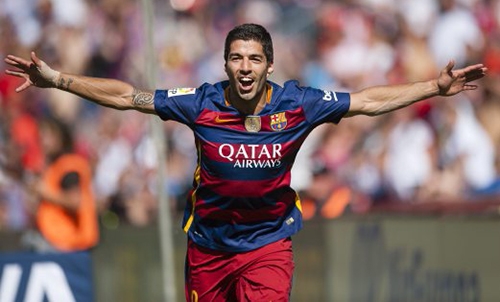 Suarez hat-trick fires Barca to La Liga title