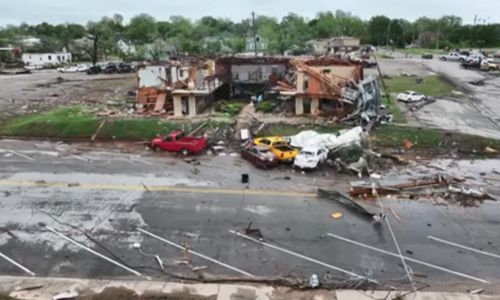 Dozens of tornadoes plow central US, at least 5 killed