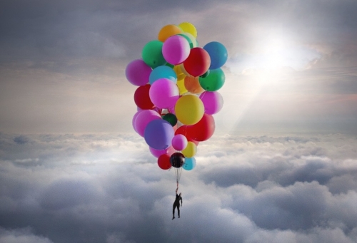 Daredevil David Blaine Flies Into The Sky With 52 Helium Balloons.