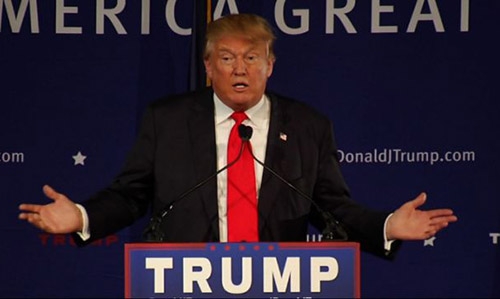 Trump shrugs off jihadist video that uses his Muslim ban remarks