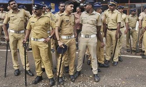 Two women enter a temple; a country erupts Two women enter a temple; a country erupts