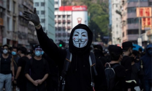 Hong Kong to ban face masks in bid to curb violence - media