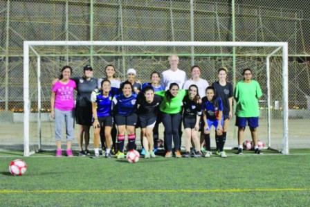 Female soccer players get tips from US coach