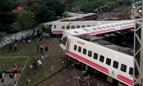 17 dead after train flips in Taiwan