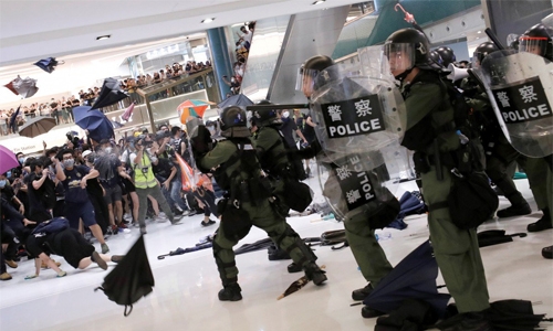 Hong Kong leader condemns ‘rioters’ after violent mall clash