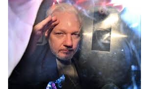 UK minister signs US bid to extradite Assange UK minister signs US bid to extradite Assange