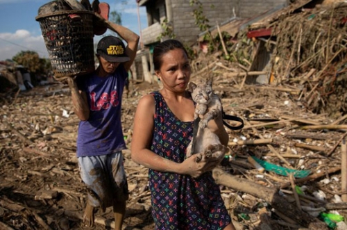 Philippines' typhoon deaths rise as worst floods in 45 years hit north