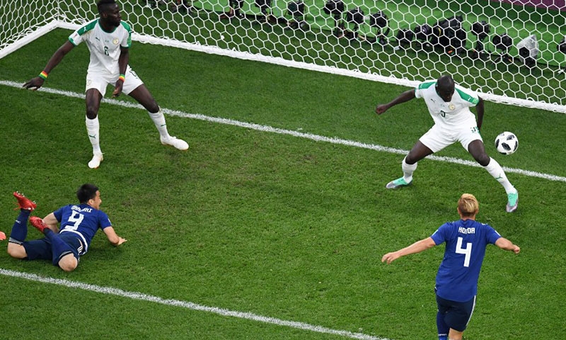  Senegal, Japan keep hopes alive