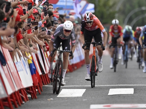 Philipsen wins Vuelta stage 19 for treble