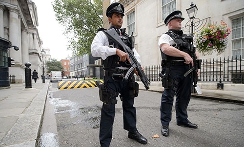 Three charged with 'terror' offences in Britain Three charged with 'terror' offences in Britain