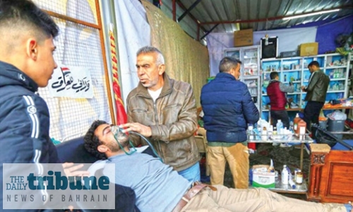 12 dead, hundreds wounded as protesters clash with Iraq security forces