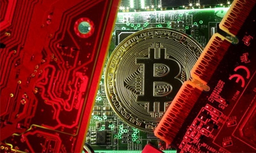 Bitcoin hits  new record as warnings grow louder