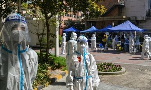 Shanghai defends policy of separating Covid-positive kids from parents Shanghai defends policy of separating Covid-positive kids from parents