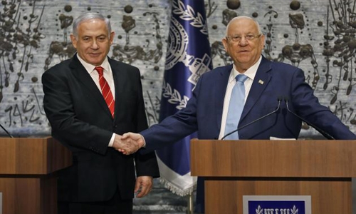 Israel's president picks Netanyahu opponent Yair Lapid to form government Israel's president picks Netanyahu opponent Yair Lapid to form government