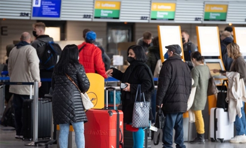 WHO urges countries to test travellers instead of banning them
