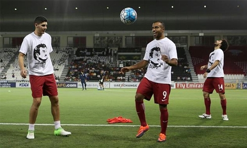 Qatar risk FIFA action after T-shirt protest