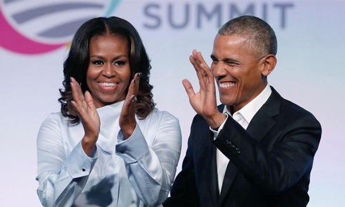 Obamas sign deal to produce podcasts for Spotify