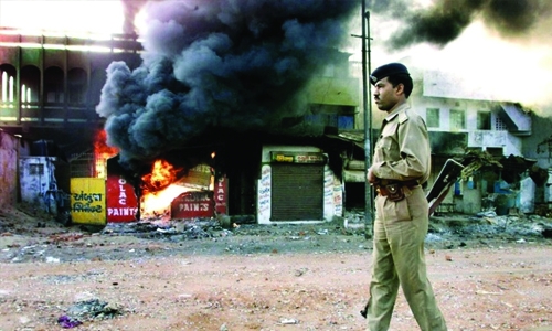 Indian court acquits 14 over 2002 massacre of Muslims