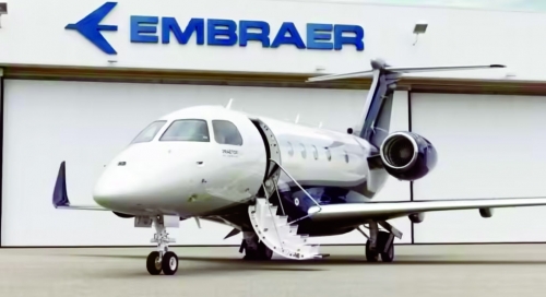 India's Adani signs pact with Brazil's Embraer to build planes India's Adani signs pact with Brazil's Embraer to build planes