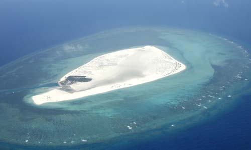 Vietnam slams China over military drills in disputed sea