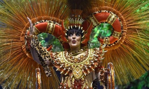 Rio Carnival dances toward wild finale, swatting Zika aside