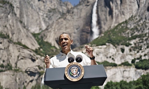 Obama pushes environmental record on family 