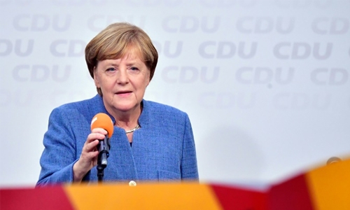 Vote winner Merkel faces tricky coalition talks, hard-right 'earthquake' Vote winner Merkel faces tricky coalition talks, hard-right 'earthquake'