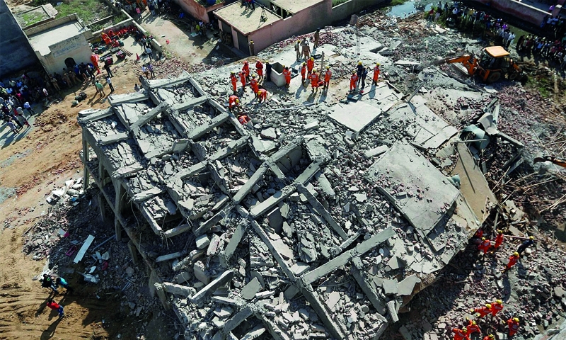 Death toll from India building collapse hits nine