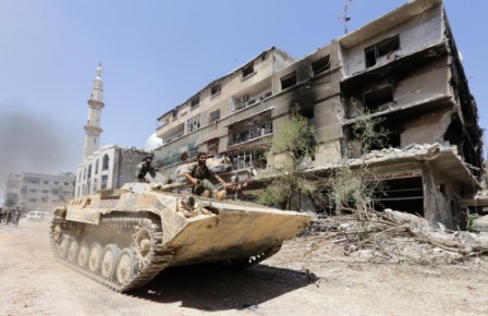 Battling rebels, IS moves closer to central Damascus: monitor