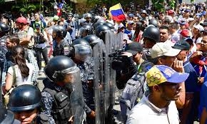 Police block protesters as tensions rise in Venezuela