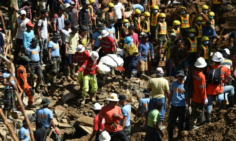 Philippines toll climbs as searchers dig for missing