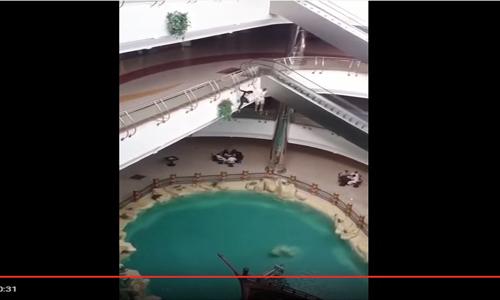 Two jump into pool from mall's second floor 