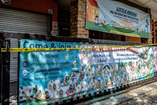 Indonesian police charge 13 in daycare abuse scandal