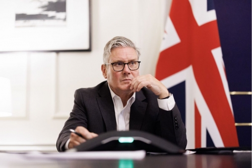 UK PM under pressure after top aide quits amid political storm