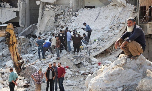 Students among 22 dead as raids hit Syria school
