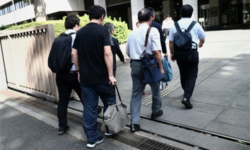 Japan man sues firm for ‘paternity leave harassment’